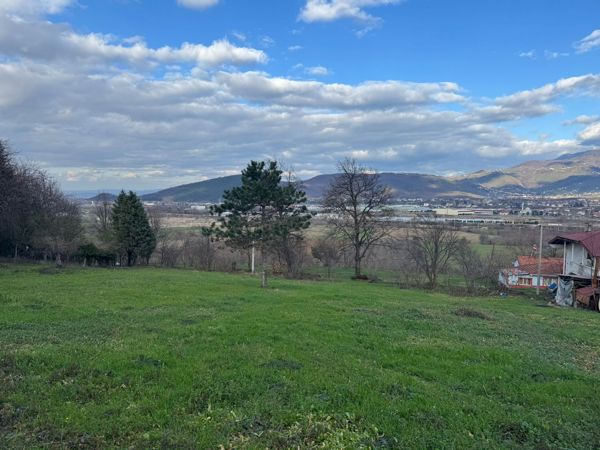 TAŞBURUN'DA 3.000m2 SATILIK KISMİ İMARLI ARSA